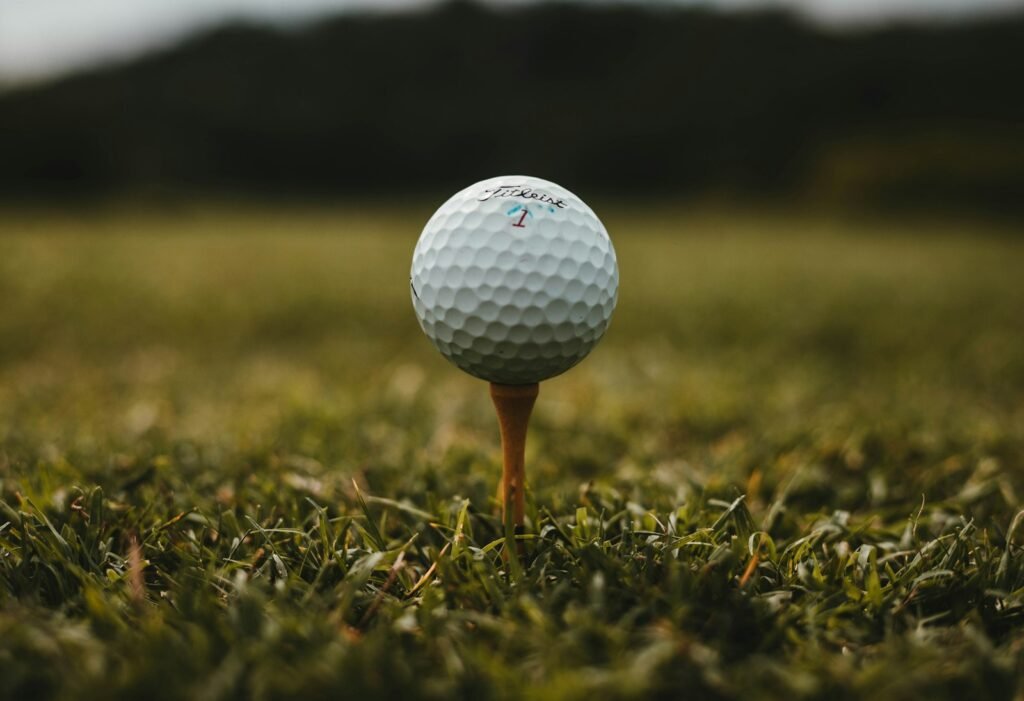 Photo by Will Porada closeup photo of white golf ball